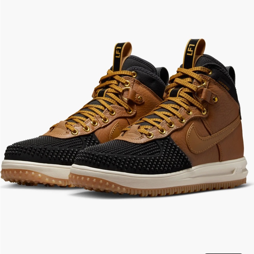 Stylish Black and Tan High-Top Boots